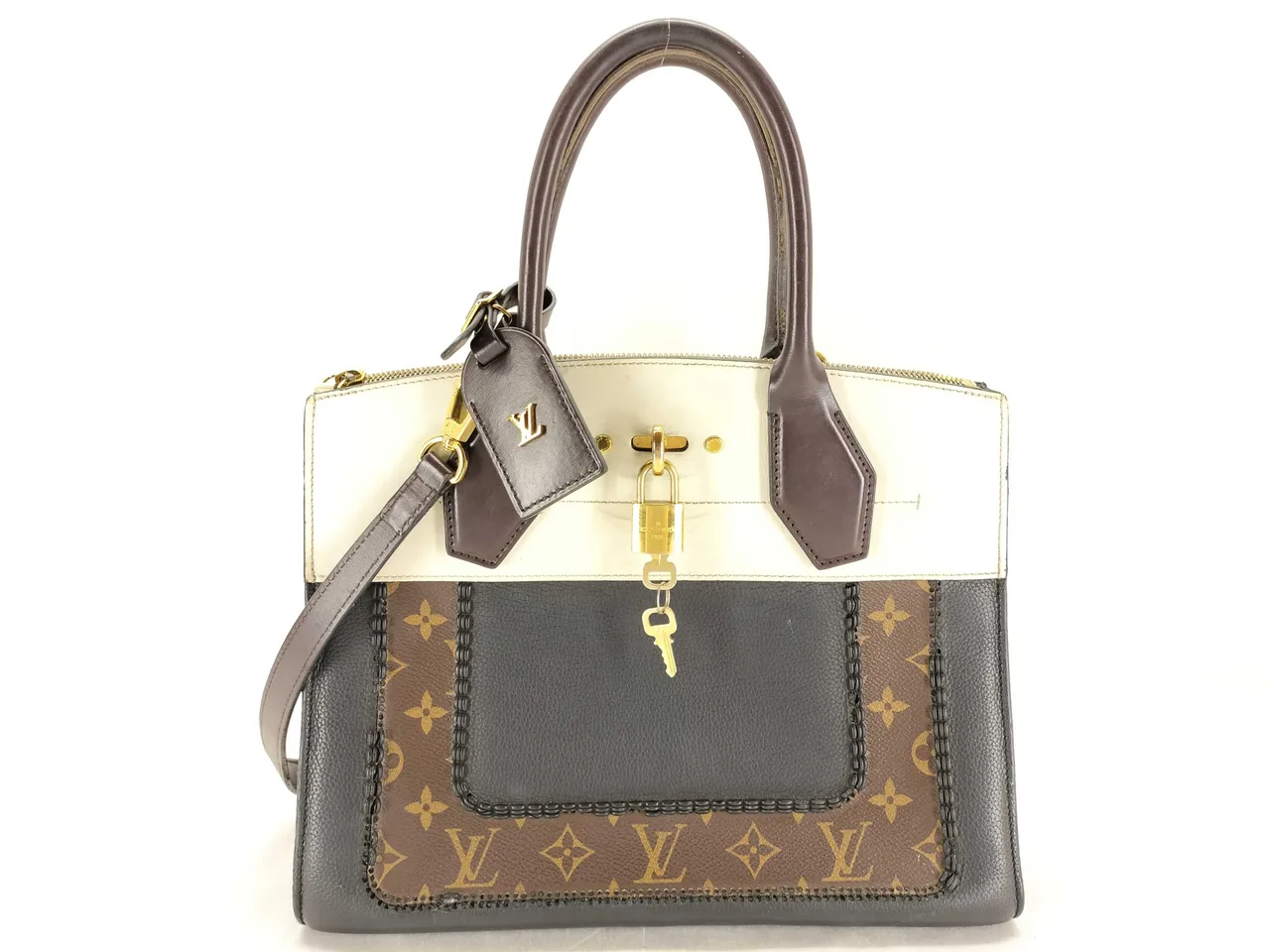 路易威登字母组合 PH-Louis Vuitton 字母组合 皮革 C. 蒸汽包 三色 M 手袋