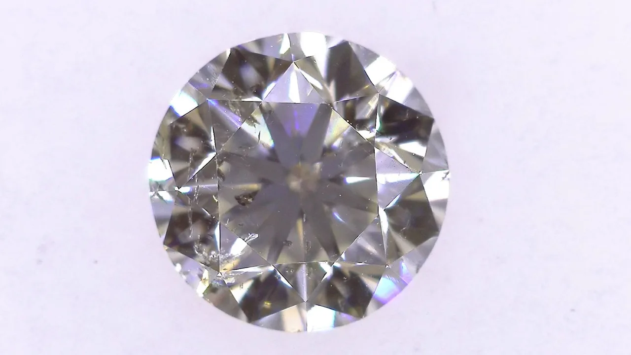 0.912ct K I-1 FAIR/GD/VG STRONG BLUE NATURAL 5.93-5.99X3.89mm Diamond Loose
