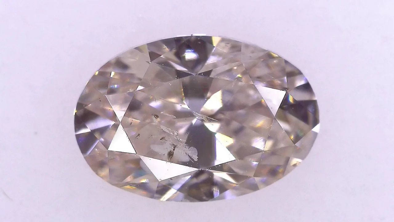 1.537克拉 FANCY LIGHT ORANGEY PINK I-1 ****/GD/GD 强蓝色 Strong Natural 8.91-6.07X4.11mm OV Diamond Loose